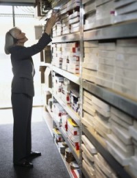 Businesswoman in Storage Room